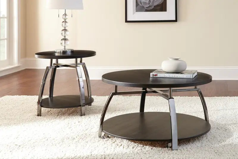 Elegant Cocktail Table with Casters: Soft Round Top, Black Nickel Base