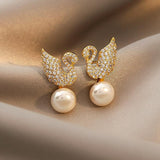 Sterling Silver Needle Swan Zircon Pearl Stud Earrings: Elegant Beauty for Every Occasion