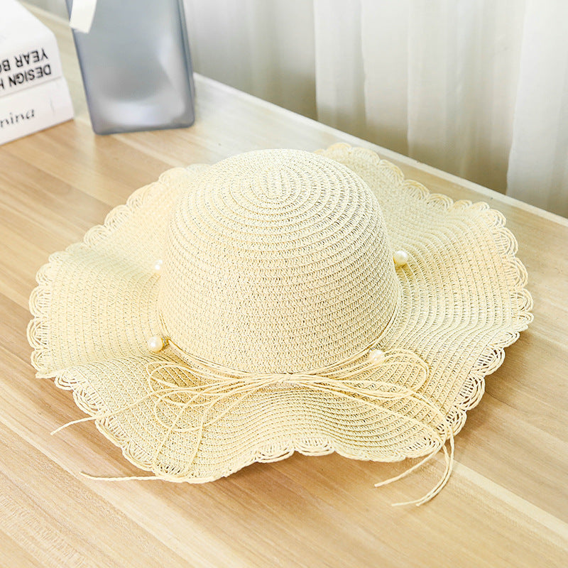 Summer seaside vacation beach hat bow ribbon female sunscreen straw hat folding