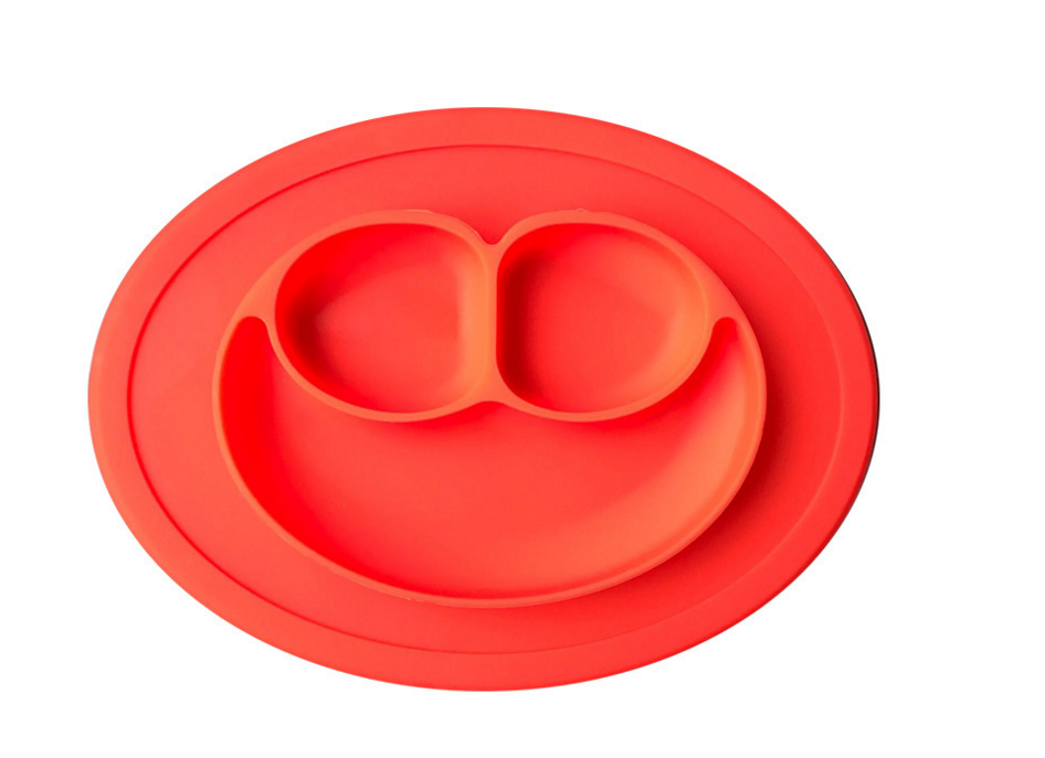 Children's meal pad with silicone smiling face plate