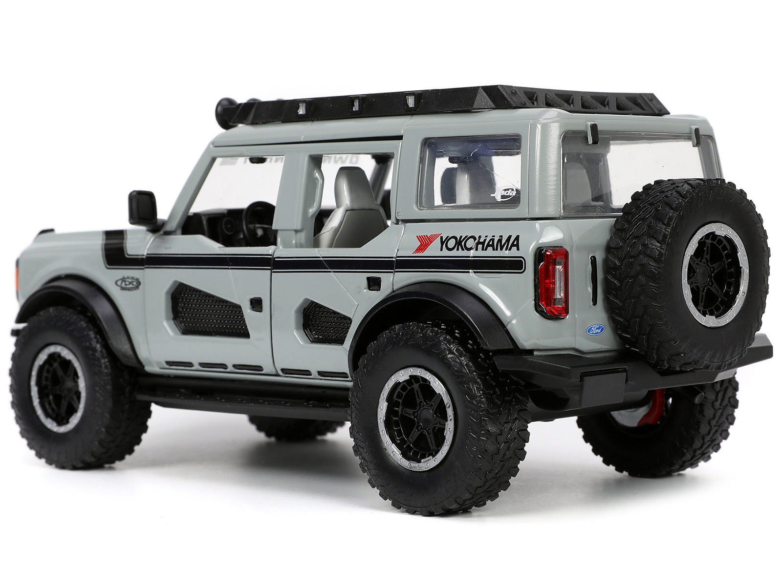 2021 Ford Bronco Gray with Black Stripes with Roof Rack "Own the Night" "Just Trucks" Series 1/24 Diecast Model Car by Jada - Minihomy