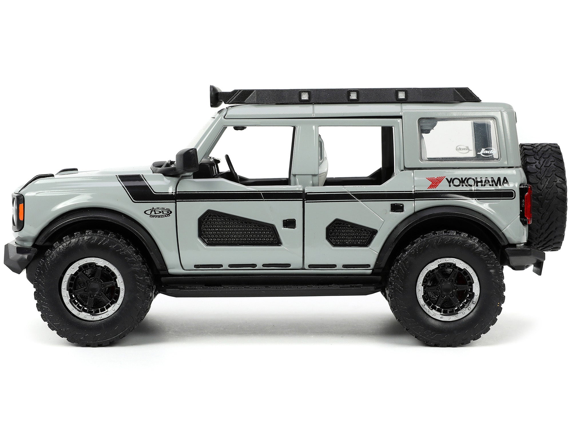 2021 Ford Bronco Gray with Black Stripes with Roof Rack "Own the Night" "Just Trucks" Series 1/24 Diecast Model Car by Jada - Minihomy