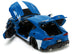 2020 Toyota Supra Blue with Graphics and Max Sterling Diecast Figurine "Robotech" "Hollywood Rides" Series 1/24 Diecast Model Car by Jada - Minihomy