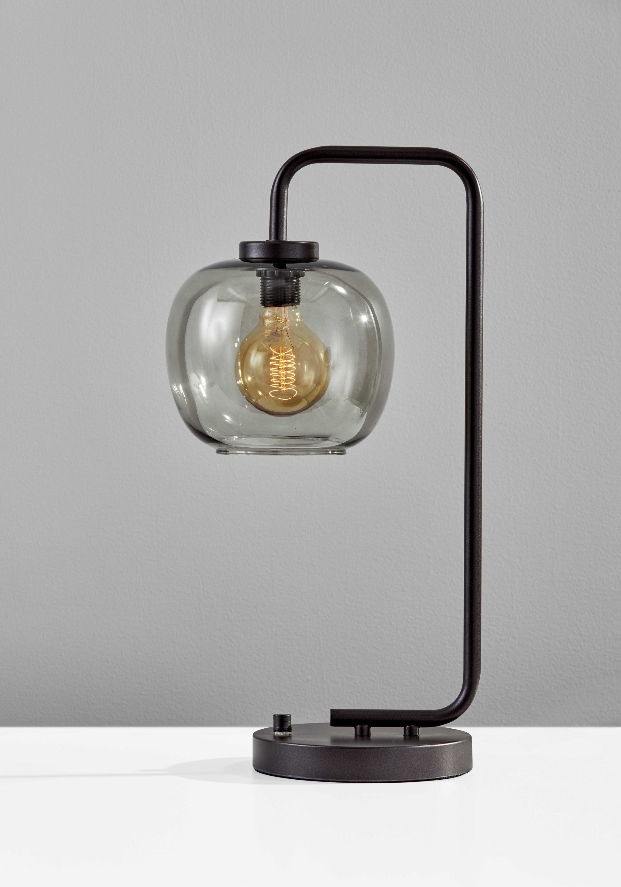 Smoked Glass Globe Shade With Vintage Edison Bulb And Matte Black Metal Arc Table Lamp