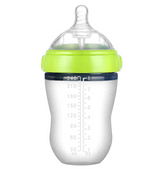 Baby's bottle with spoon