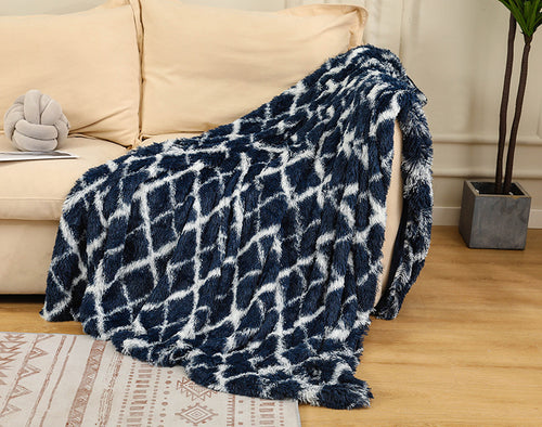 Cozy up in elegance with our Faux Fur Throw Blanket