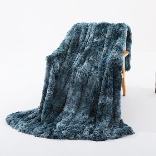 Cozy up in elegance with our Faux Fur Throw Blanket