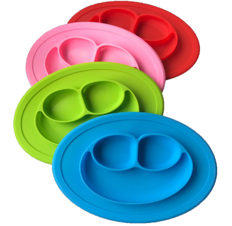 Children's meal pad with silicone smiling face plate