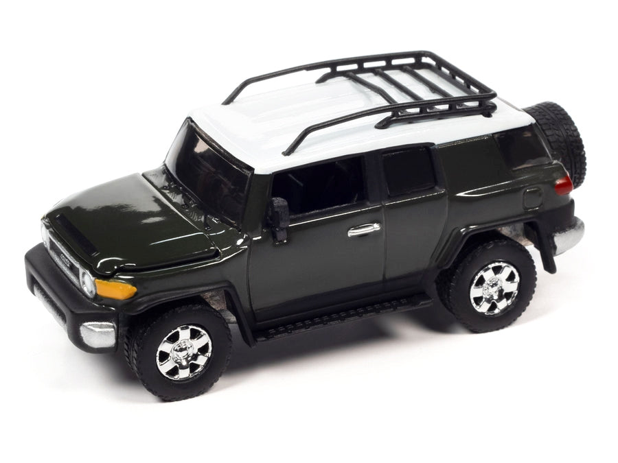 2010 Toyota FJ Cruiser Dark Green with White Top and Roof Rack with Camping Trailer - Minihomy