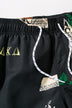 Full Size Newspaper Print Drawstring Waist Swim Trunks - Minihomy